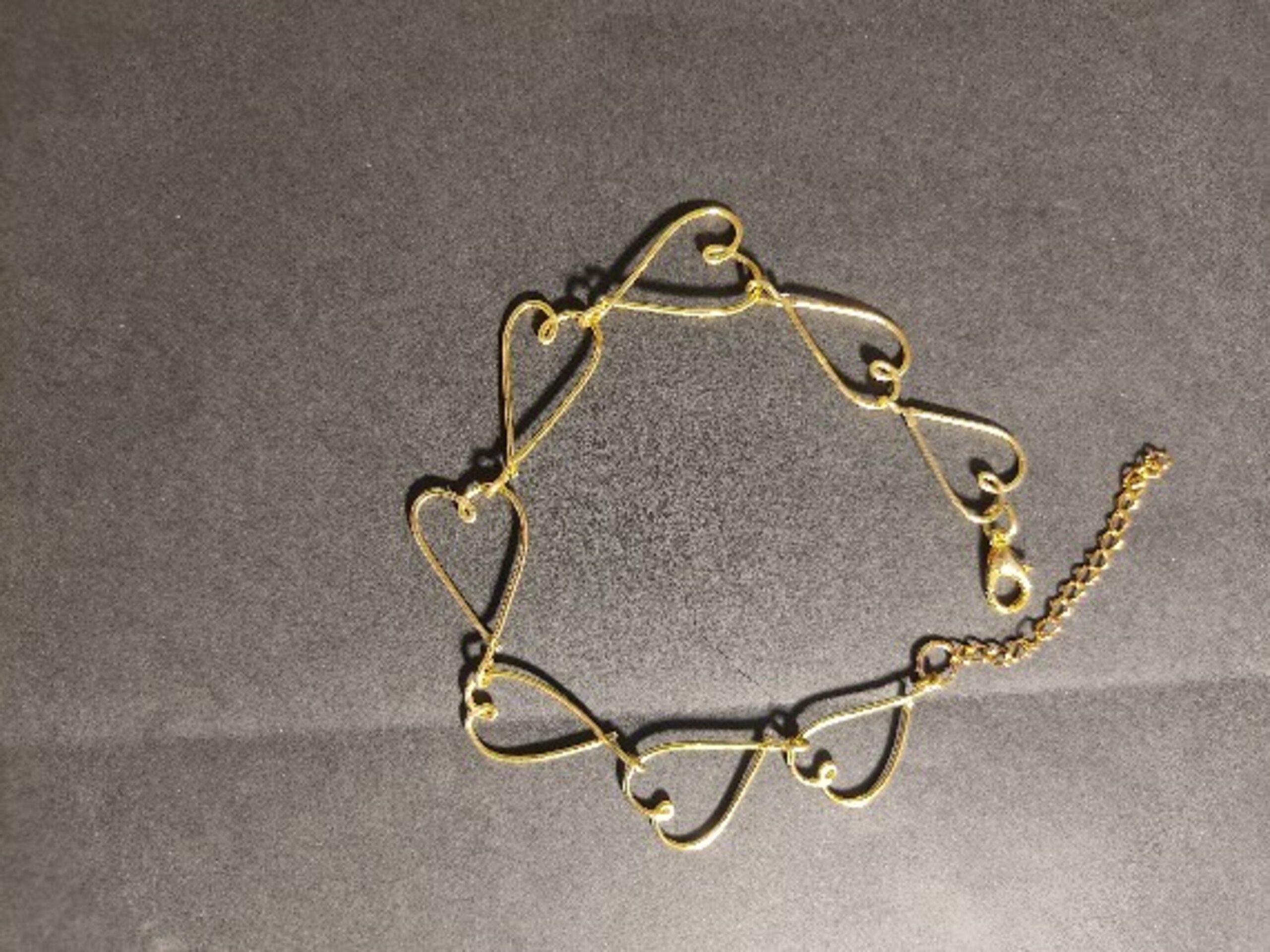 Pulsera corazones dorados - 3
